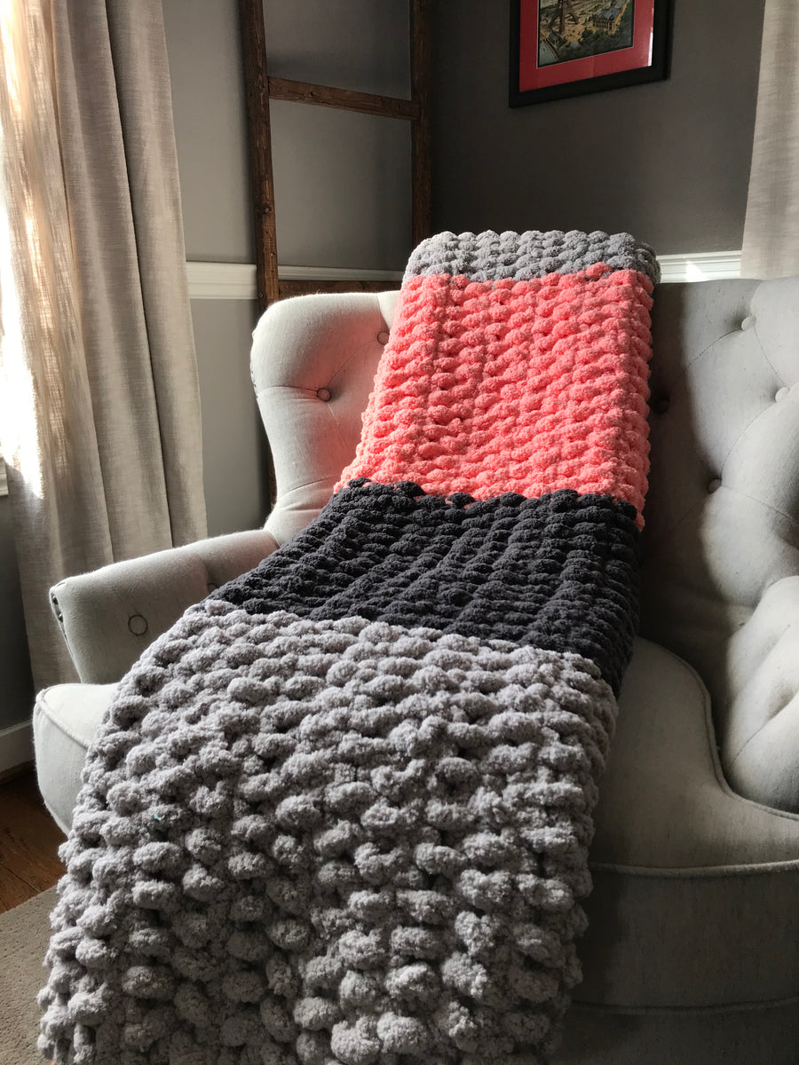 Coral chunky 2025 knit blanket